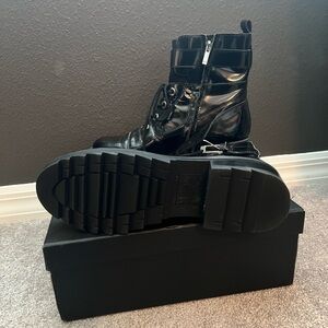Get ready for fall with these black combat boots by Marc Fisher